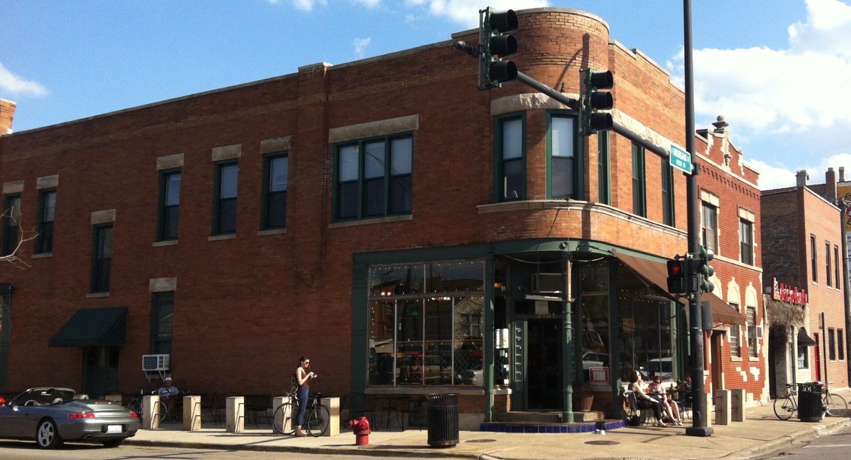 The corner brick building at Morgan Street housing Bridgeport Coffeehouse