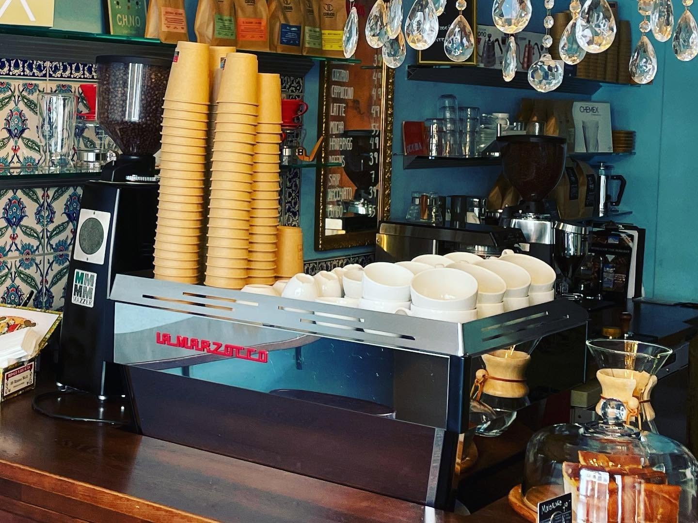 The espresso bar with a La Marzocco machine and Chemex brewers at Cuba Life Kaffebar