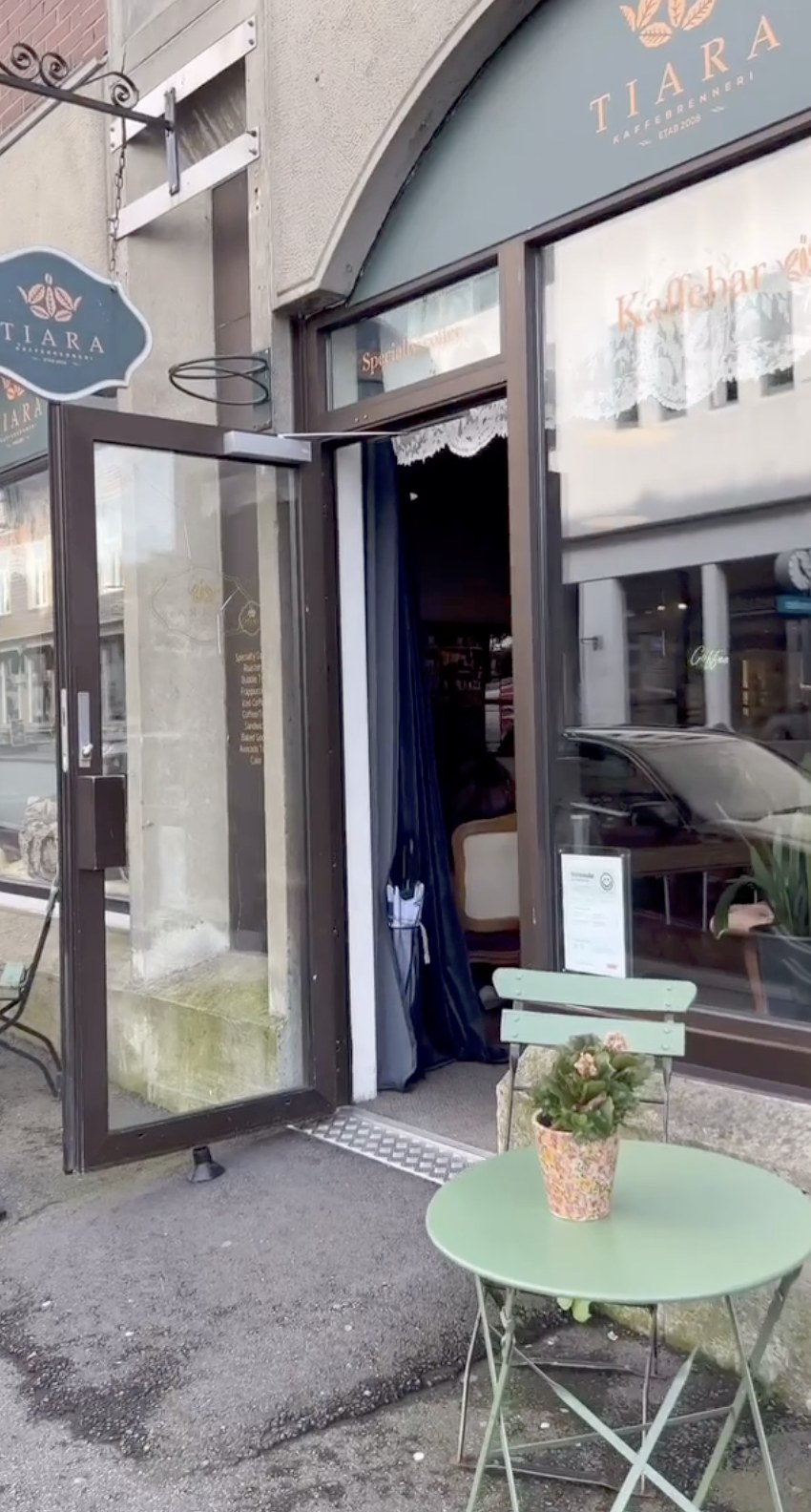 The Markens gate storefront with the branded Tiara Kaffebrenneri sign