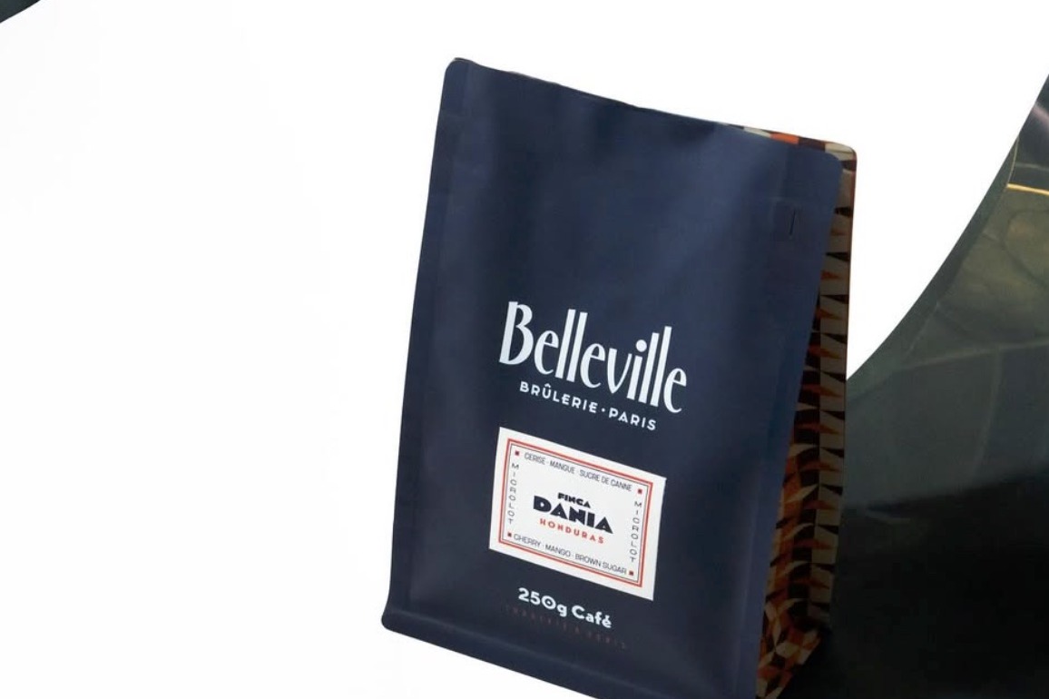 A navy 250g bag of Belleville Brûlerie coffee, Finca Dania Honduras microlot, cherry mango brown sugar tasting notes on the label